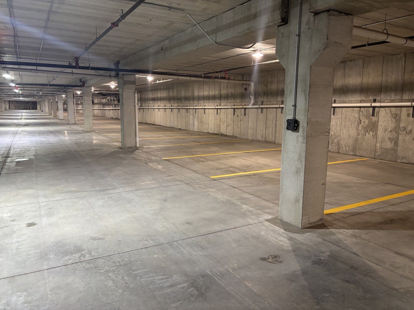 Underground parking garage with yellow striping