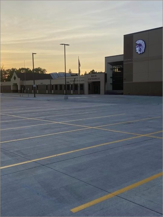 School parking lot at sunset