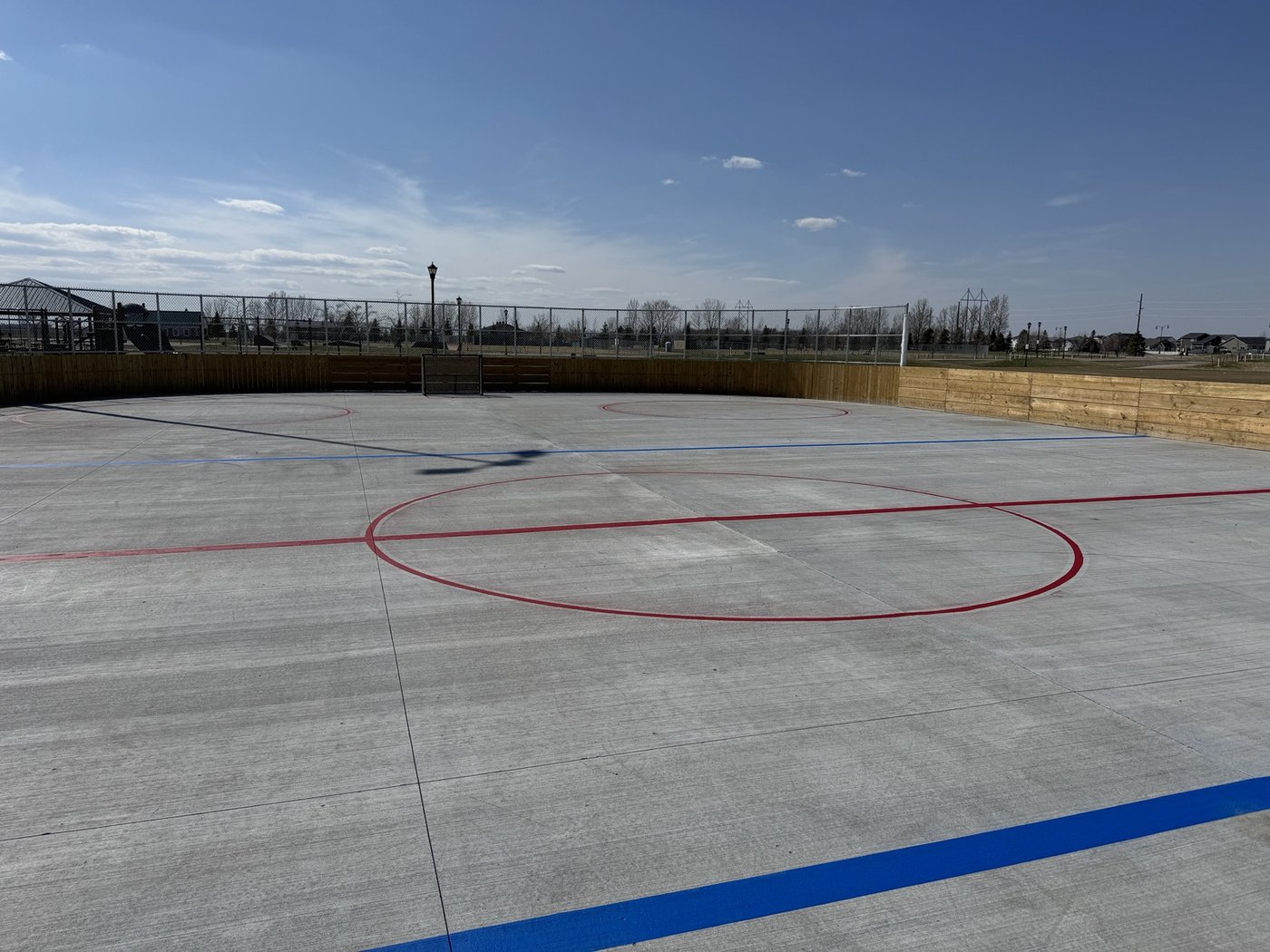 Hockey goal crease with fresh red paint
