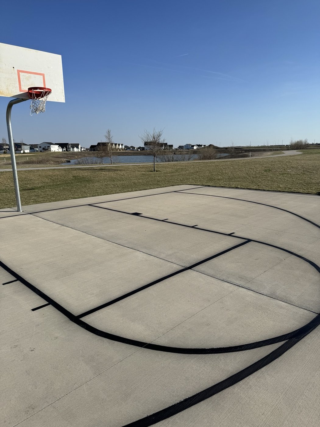 Neighborhood basketball court fresh painted
